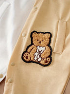 Mono de una sola pieza con botones frontale