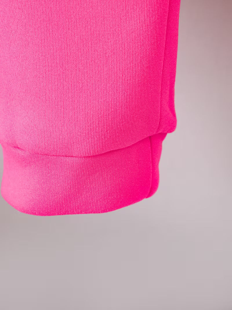 Conjunto moderno de 2 piezas: sudadera con capucha y pantalón a juego.