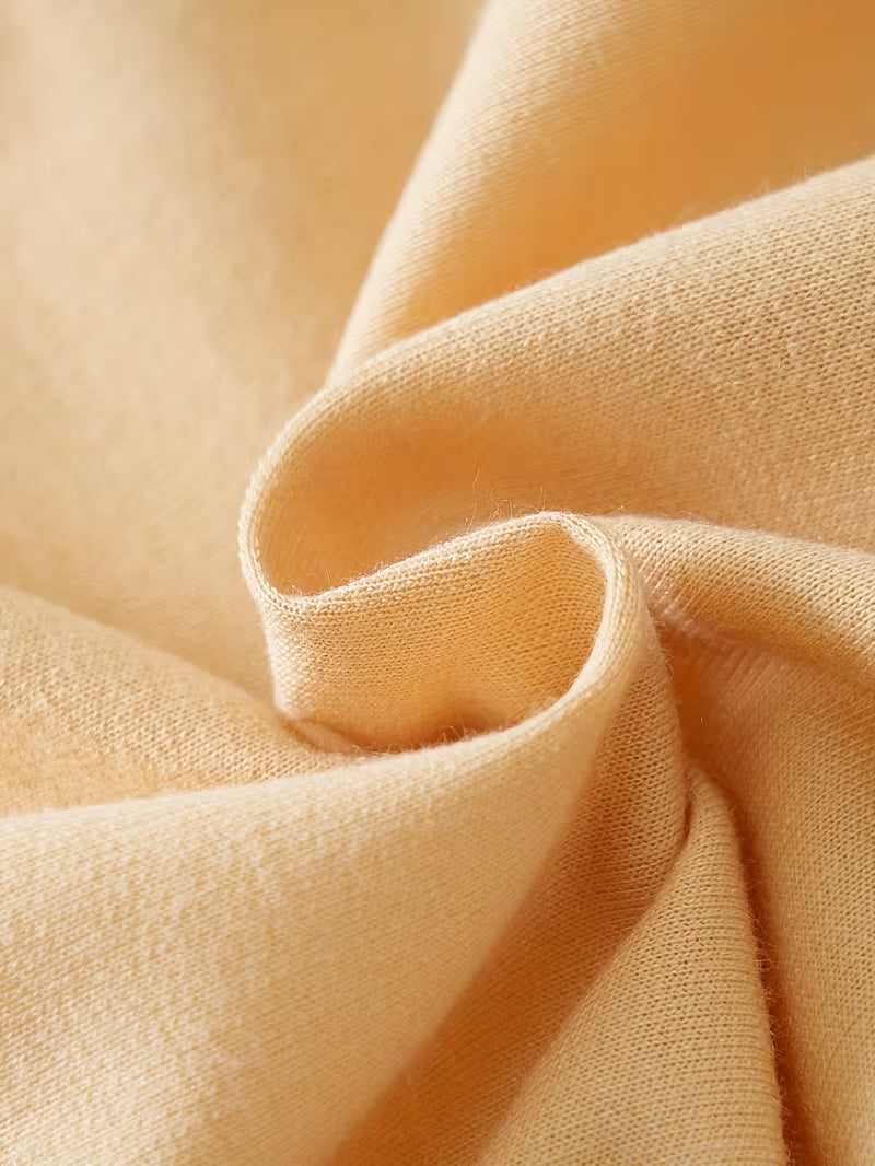 Mono de una sola pieza con botones frontale