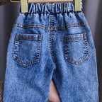 Conjunto de 2 piezas: blusa tejida con cuello decorado y pantalón vaquero.