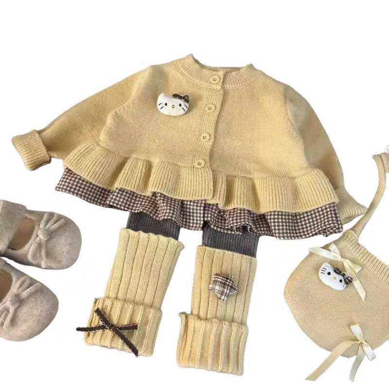 Conjunto de 2 piezas: blusa tejida con volante y pantalón de algodón elástico con calentadores para las piernas.