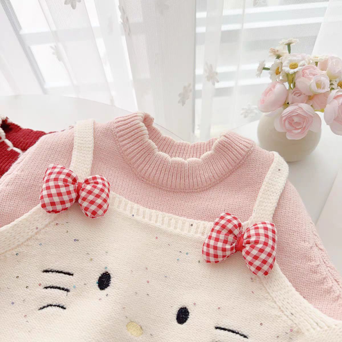 Conjunto de 2 piezas: suéter de lana y pantalón vaquero.