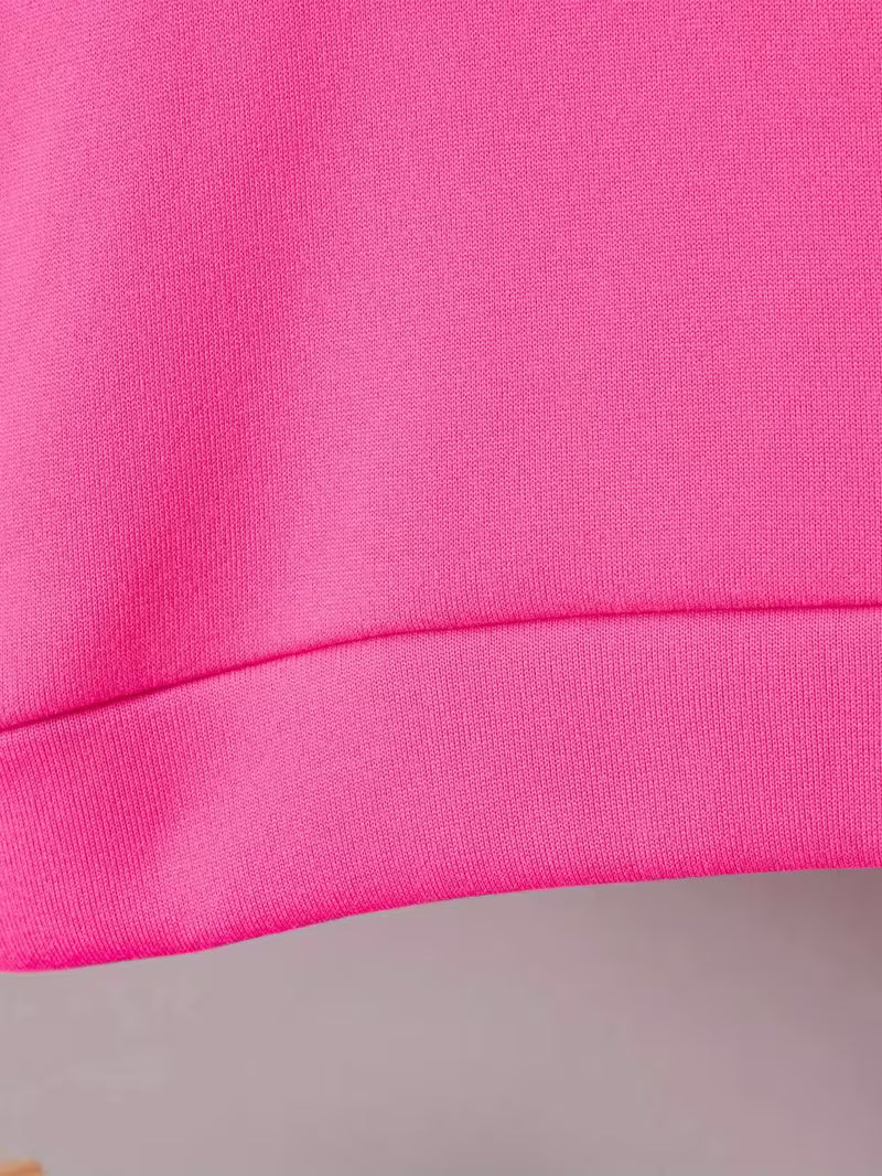 Conjunto moderno de 2 piezas: sudadera con capucha y pantalón a juego.