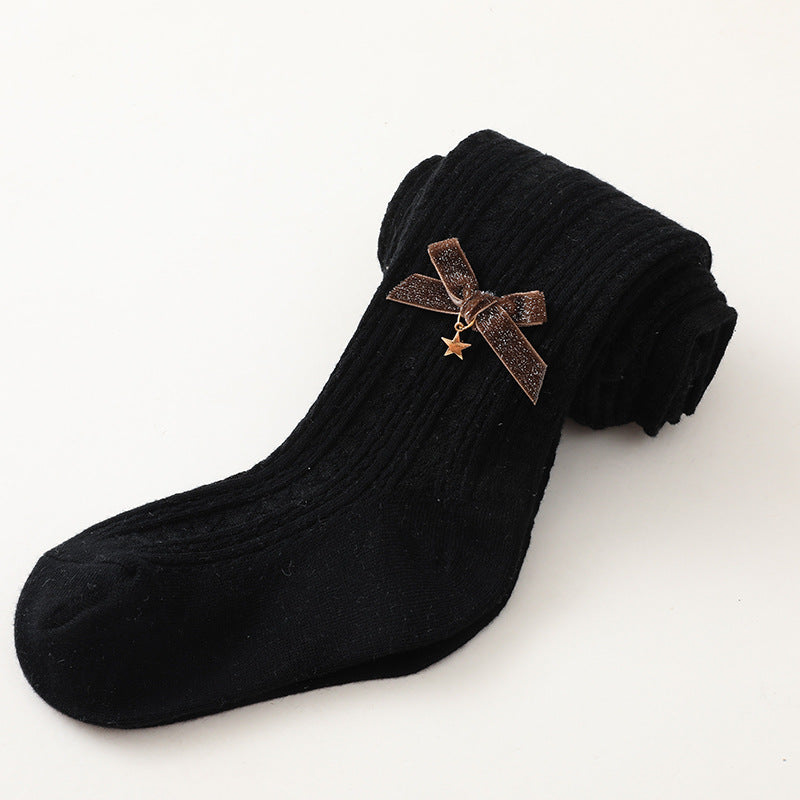 Medias elegantes para niña con lazo bordado.