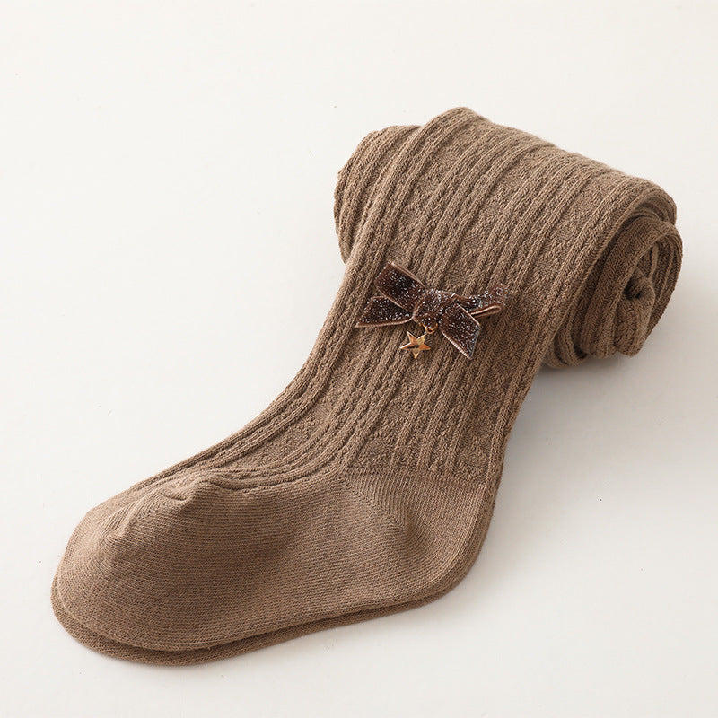 Medias elegantes para niña con lazo bordado.