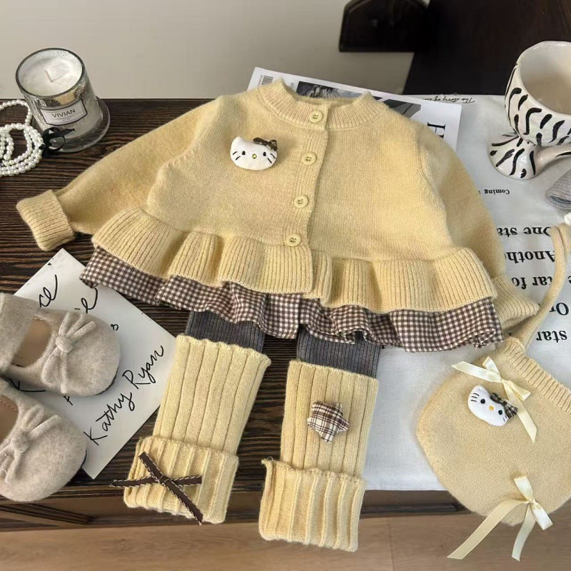 Conjunto de 2 piezas: blusa tejida con volante y pantalón de algodón elástico con calentadores para las piernas.