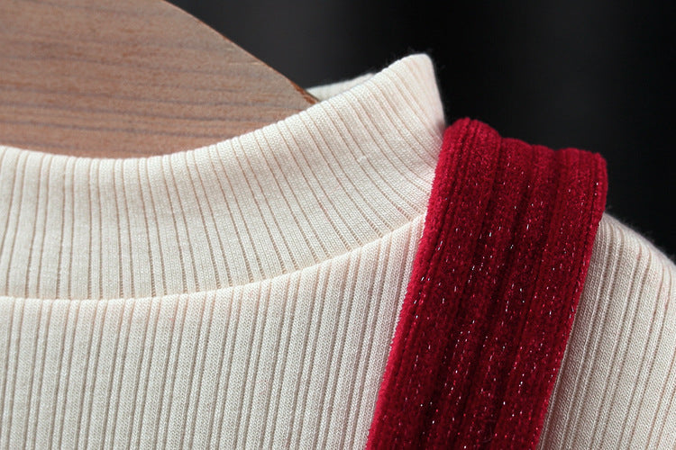 Conjunto de dos piezas para niña: suéter decorado con corazones de tela en relieve y pantalón de diseño acanalado.