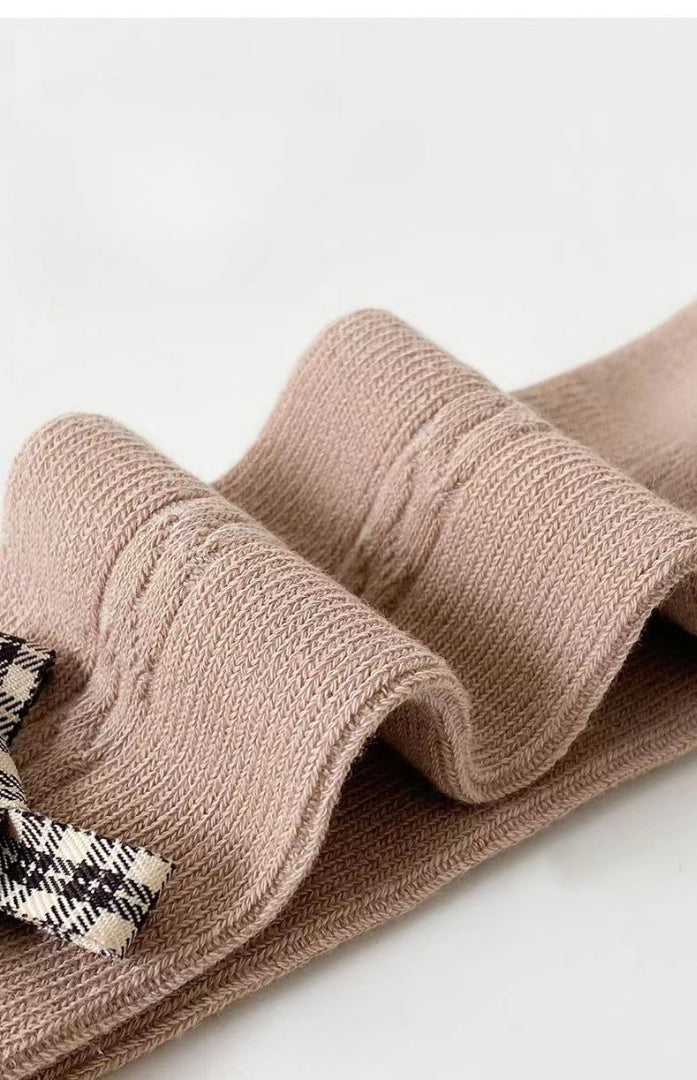 Calcetines largos y cálidos con diseño de lazo clásico