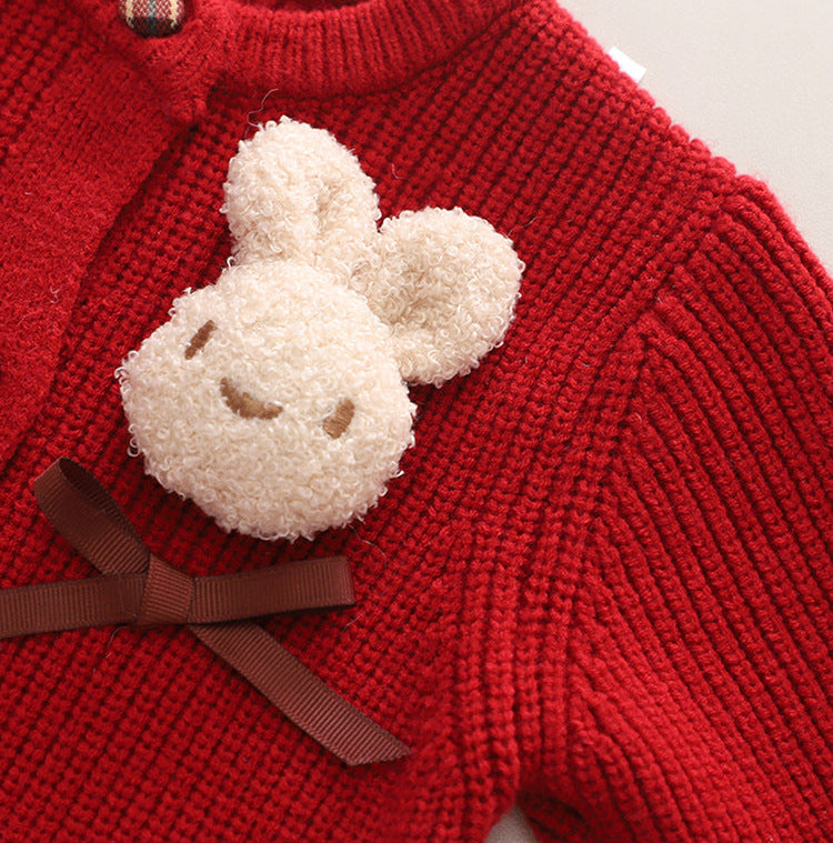 Conjunto de 2 piezas: suéter de lana y falda.