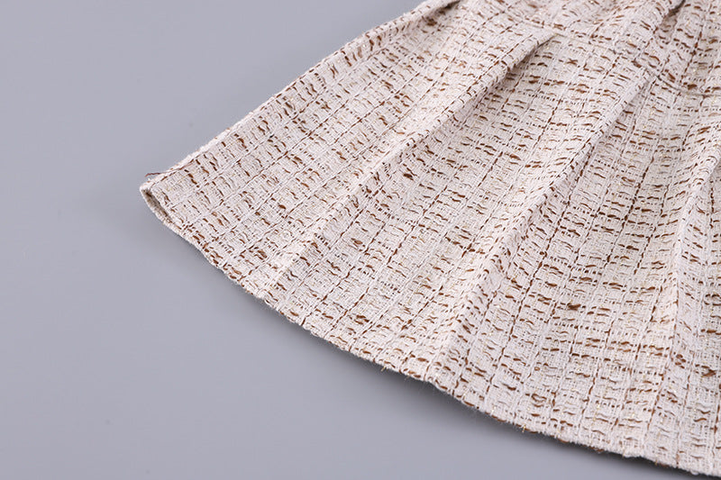 Conjunto de 3 piezas: chaleco de piel, camiseta interior cálida y falda de tweed.