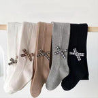 Calcetines largos y cálidos con diseño de lazo clásico