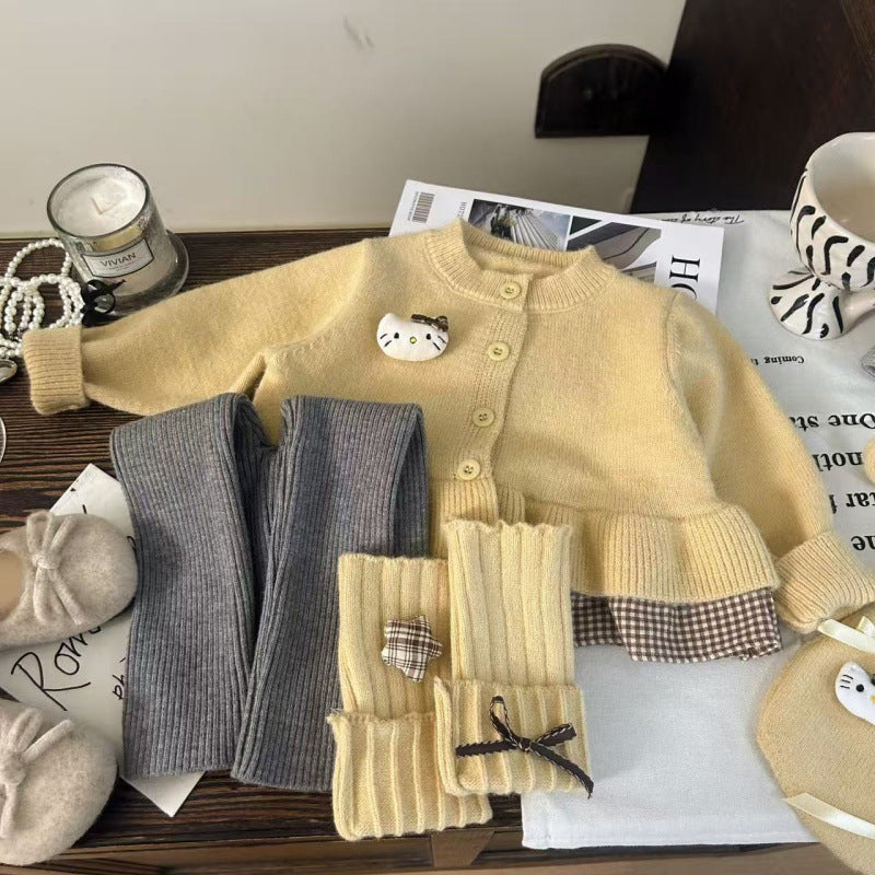 Conjunto de 2 piezas: blusa tejida con volante y pantalón de algodón elástico con calentadores para las piernas.