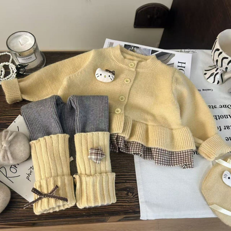 Conjunto de 2 piezas: blusa tejida con volante y pantalón de algodón elástico con calentadores para las piernas.