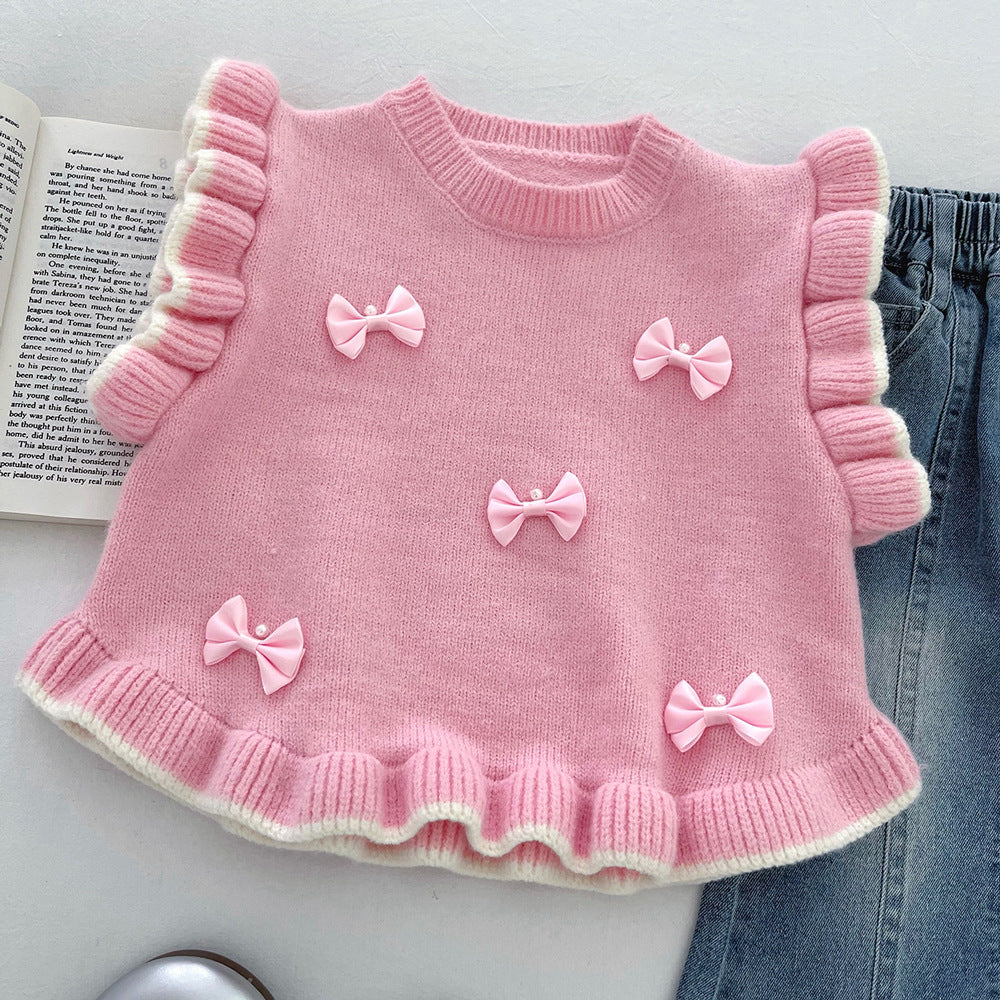 Conjunto de 2 piezas: camisa rosa con pantalón vaquero decorado.