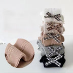 Calcetines largos y cálidos con diseño de lazo clásico