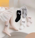 Calcetines largos y cálidos con diseño de lazo clásico