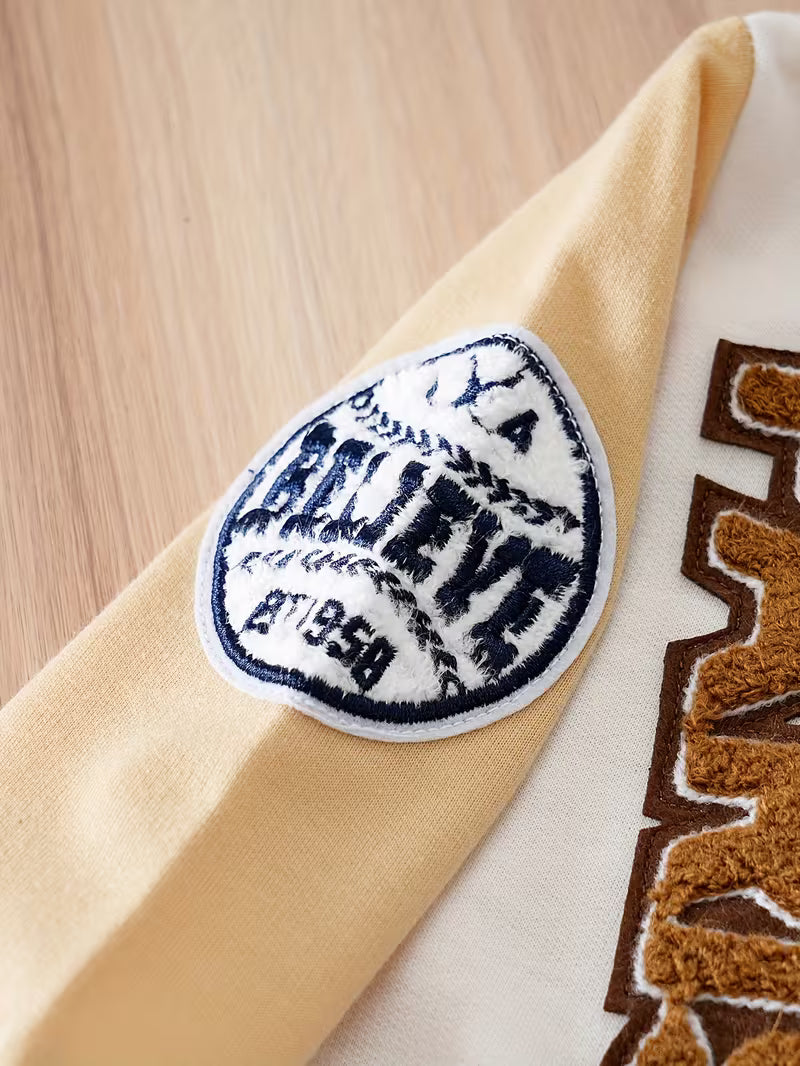 Mono de una sola pieza con botones frontale