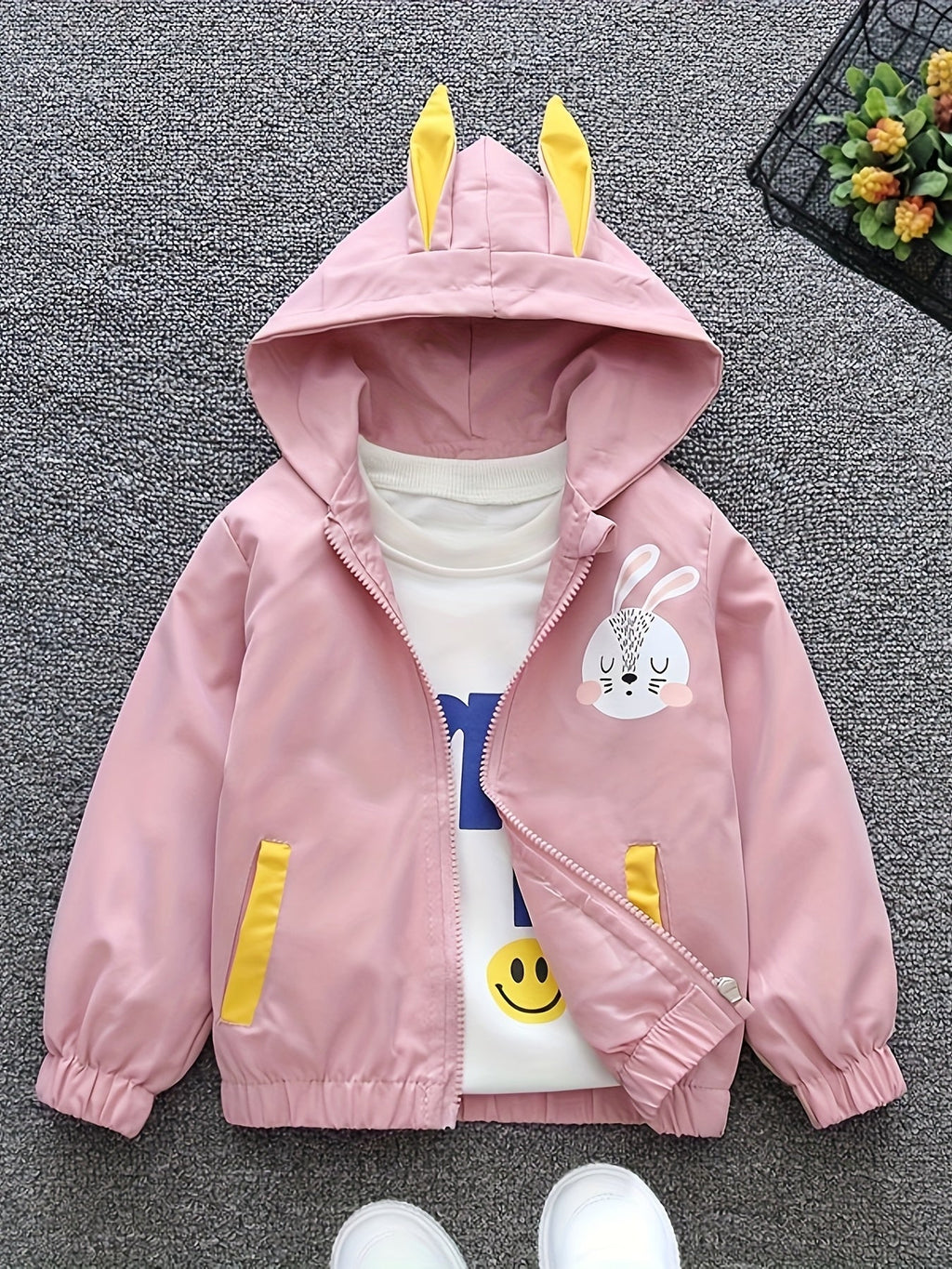 Chaqueta infantil rosa con estampado de conejito adorable