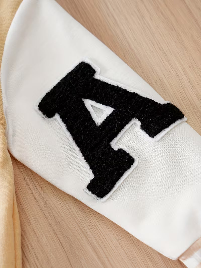 Mono de una sola pieza con botones frontale