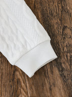 Conjunto de invierno elegante con mangas largas y vaqueros