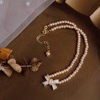 Set de joyería para niñas: Collar de perlas con pendientes en forma de lazo